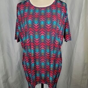 NWT Lularoe Irma, blue shirt with green and pink pattern, size XXS